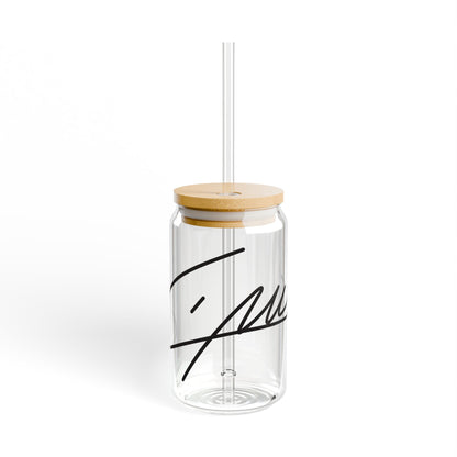 Clear glass sipper cup with bamboo lid and straw featuring Liam Payne’s replicated signature printed in bold black.