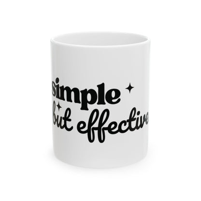 White ceramic One Direction inspired mug with the Harry Styles quote “simple but effective” printed in black text.