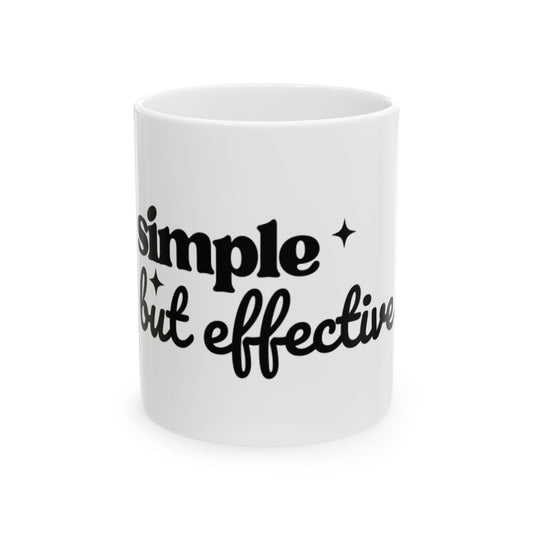 White ceramic One Direction inspired mug with the Harry Styles quote “simple but effective” printed in black text.